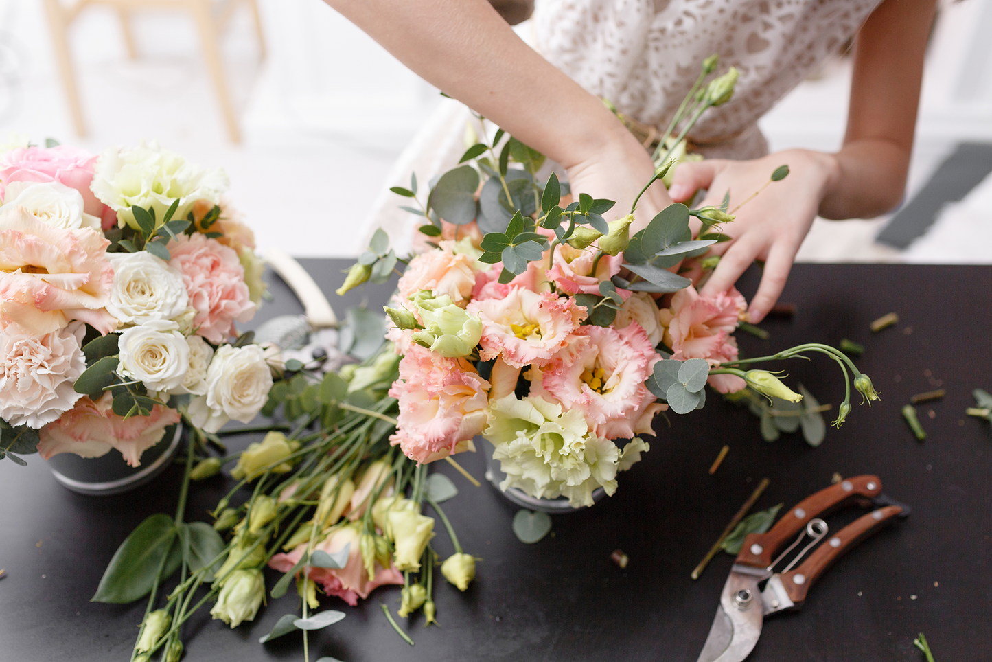 Young Person Creating Flower Arrangement in Beginner Floral Workshop Class