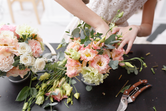 Young Person Creating Flower Arrangement in Beginner Floral Workshop Class